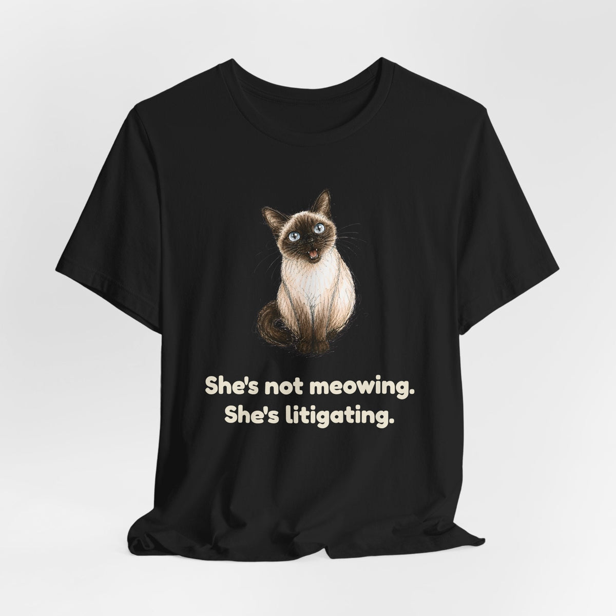 She's Not Meowing. She's Litigating. — Funny Siamese Cat T-Shirt